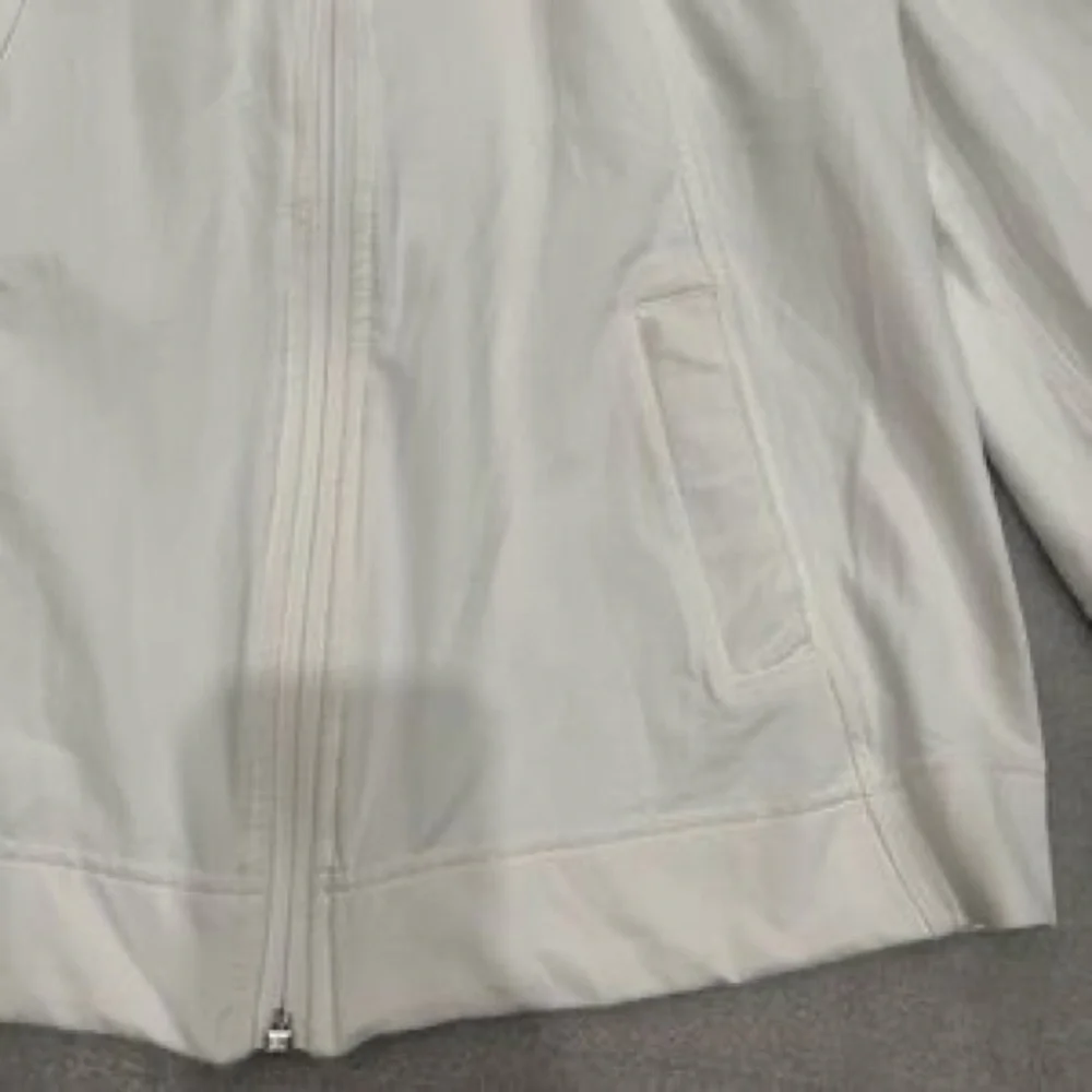 [8] Lululemon white 3/4 sleeve Stay Cool Jacket with mesh back NWOT